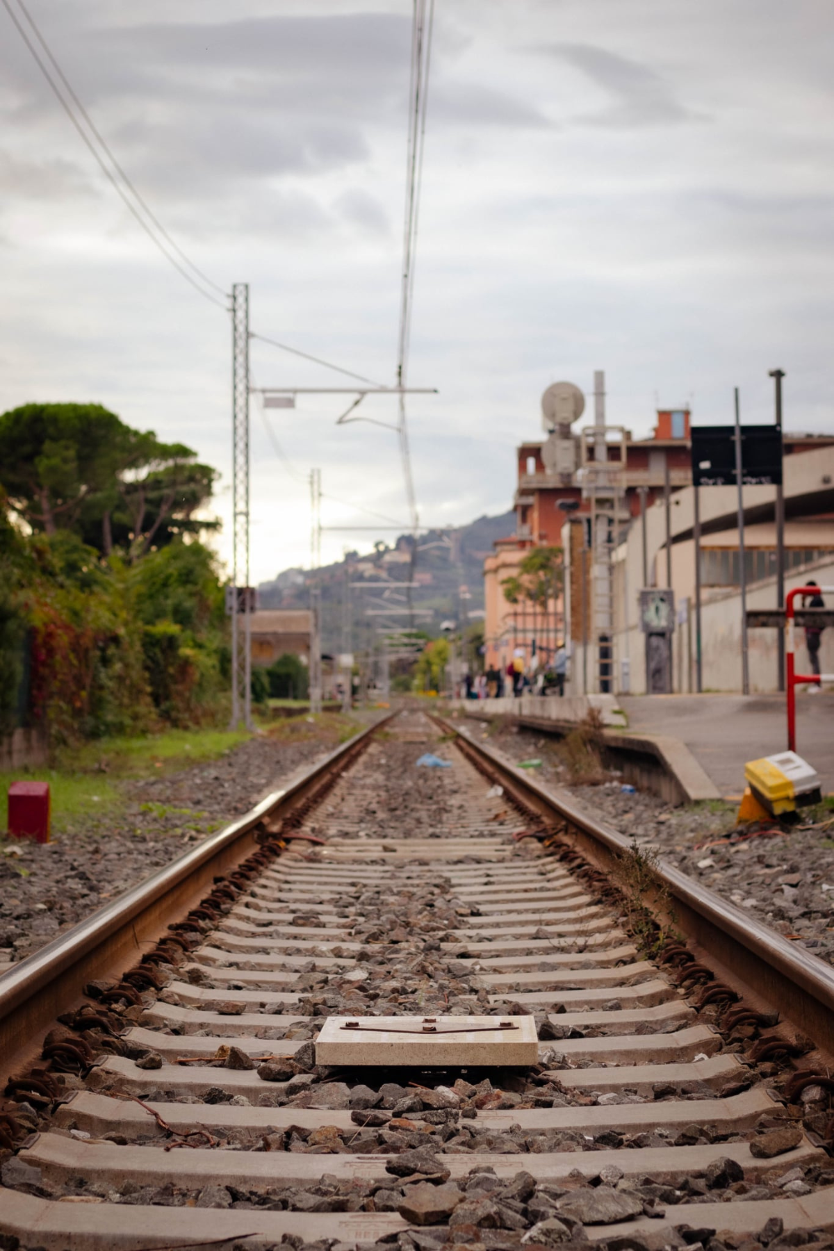 Italian train station with tracks and platforms
